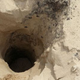 Illustration for article titled No One Knows Why Deep, Dangerous Holes Are Appearing In This Sand Dune